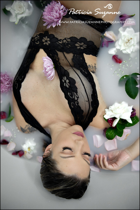 Milk Bath boudoir with black lace and flowers
